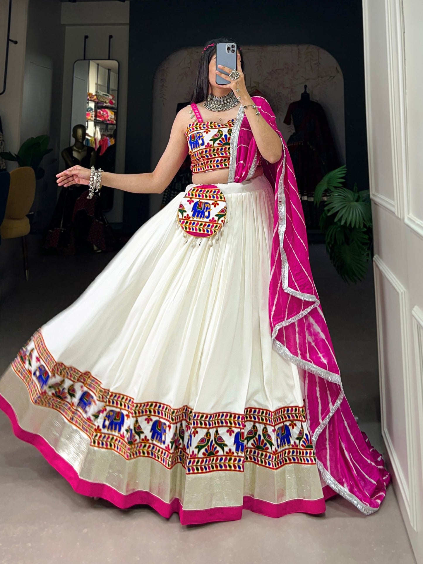 The Essence of Navratri with Our White Colour Rayon Gamthi Work Lehenga Choli