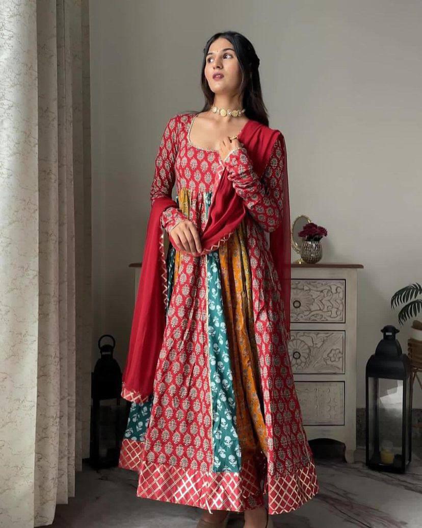 Firozi Tussar Silk Gown With Patola Print and Foil Work Beautiful Dupatta