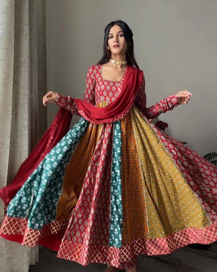 Firozi Tussar Silk Gown With Patola Print and Foil Work Beautiful Dupatta